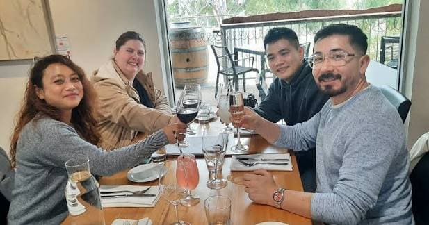 Guests enjoying lunch and wine together on a Barossa Wine Tours day out